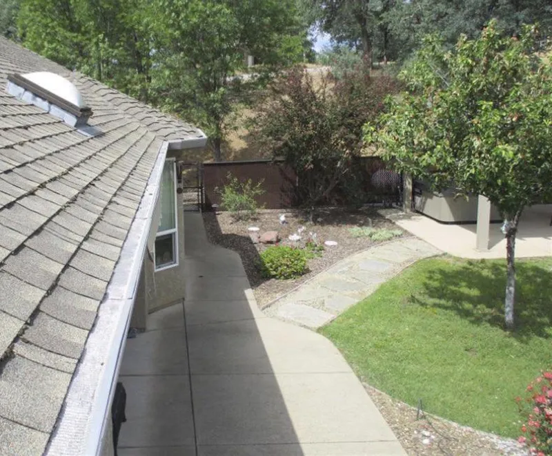 View from roofline showing clear space around home with no overhanging branches